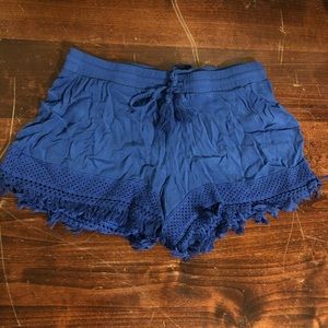 Blue cotton shorts with tassles